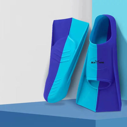 Swimming training with fins wrapped around the feet design